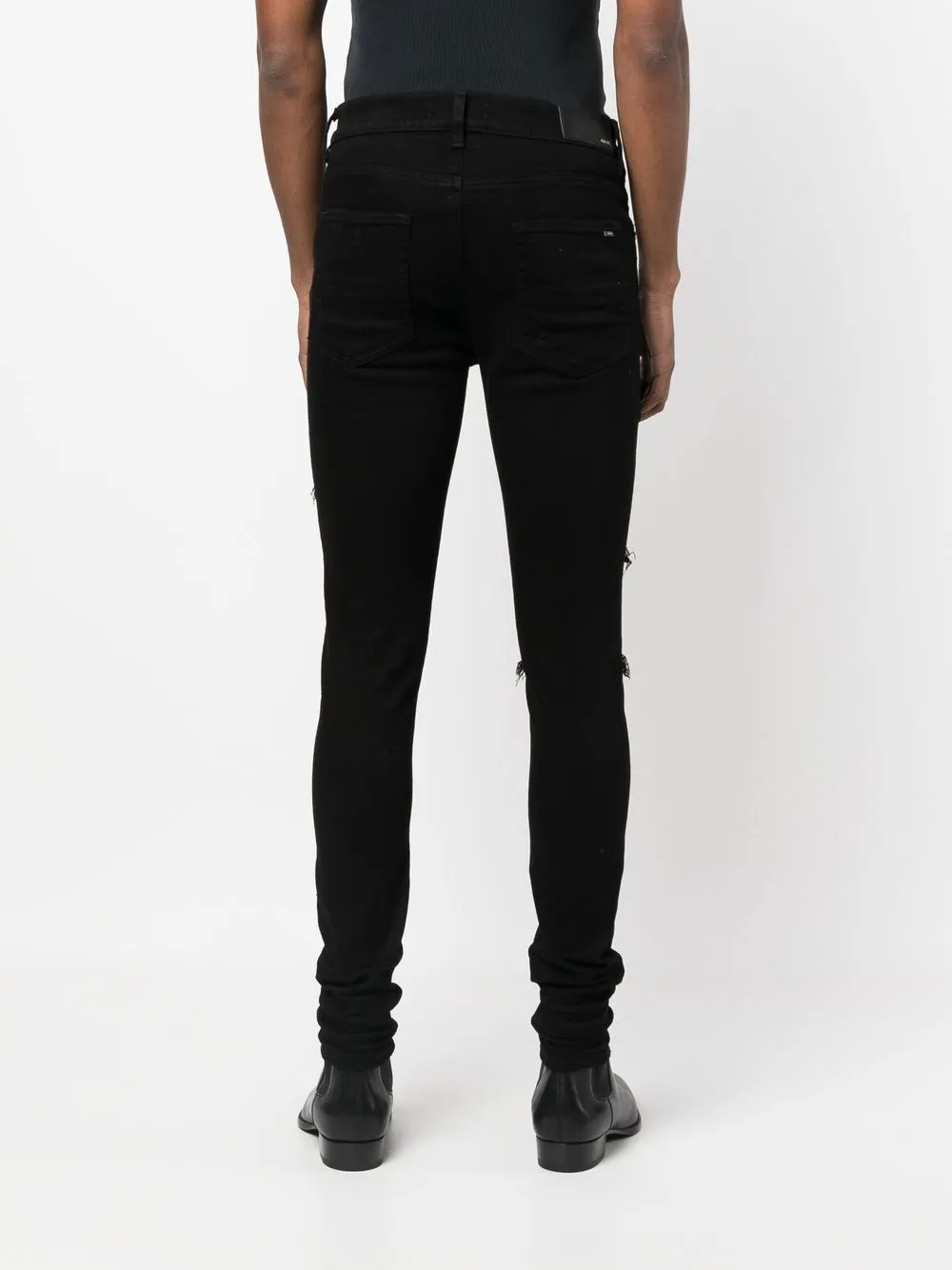 AMIRI distressed skinny-cut jeans