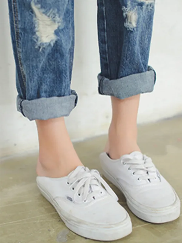 contemporary ripped denim overalls
