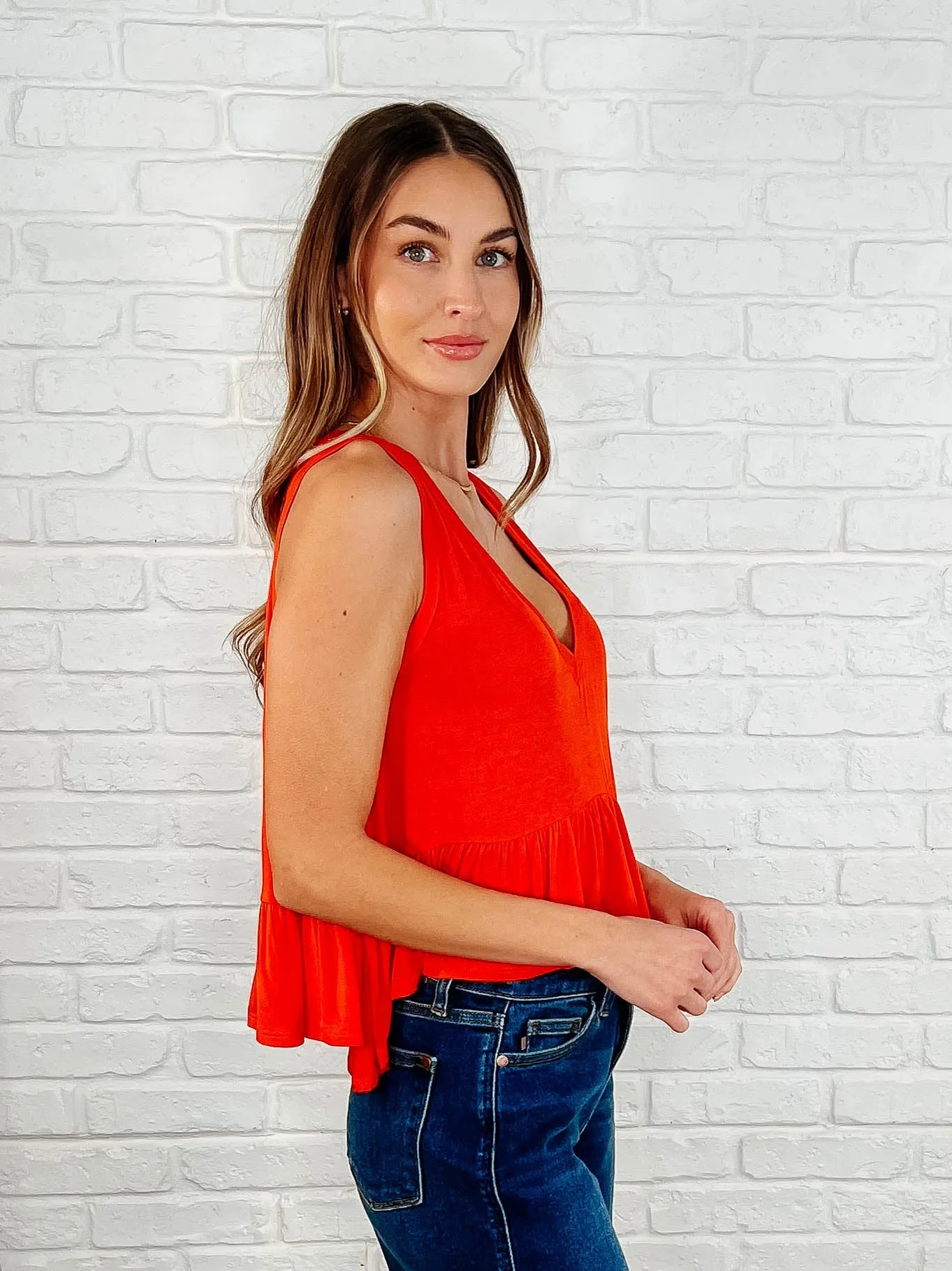 Hyland V-Neck Ruffled Peplum Top in Spicy Orange - Jersey Knit, Sleeveless, A-Line Cut
