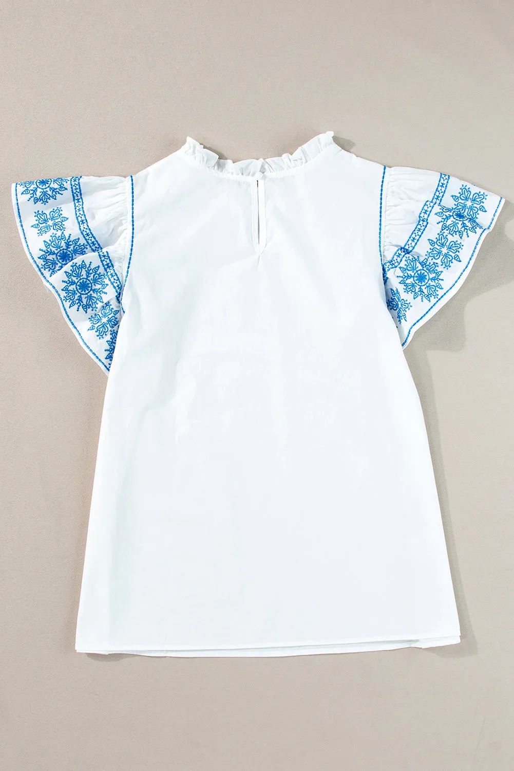 Indy Ruffled Mock Neck Cap Sleeve Blouse