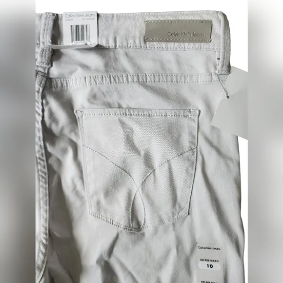 NWT CALVIN KLEIN Women's light grey skinny jeans, size 10, cotton, mid rise