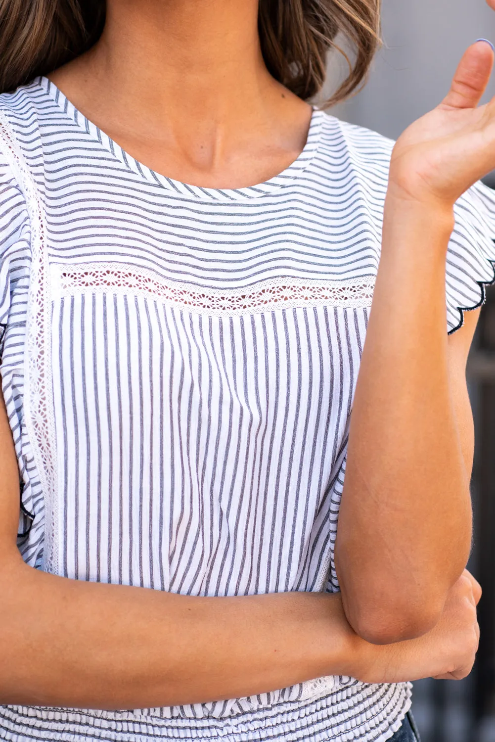Ruffle Edge Smocked Top