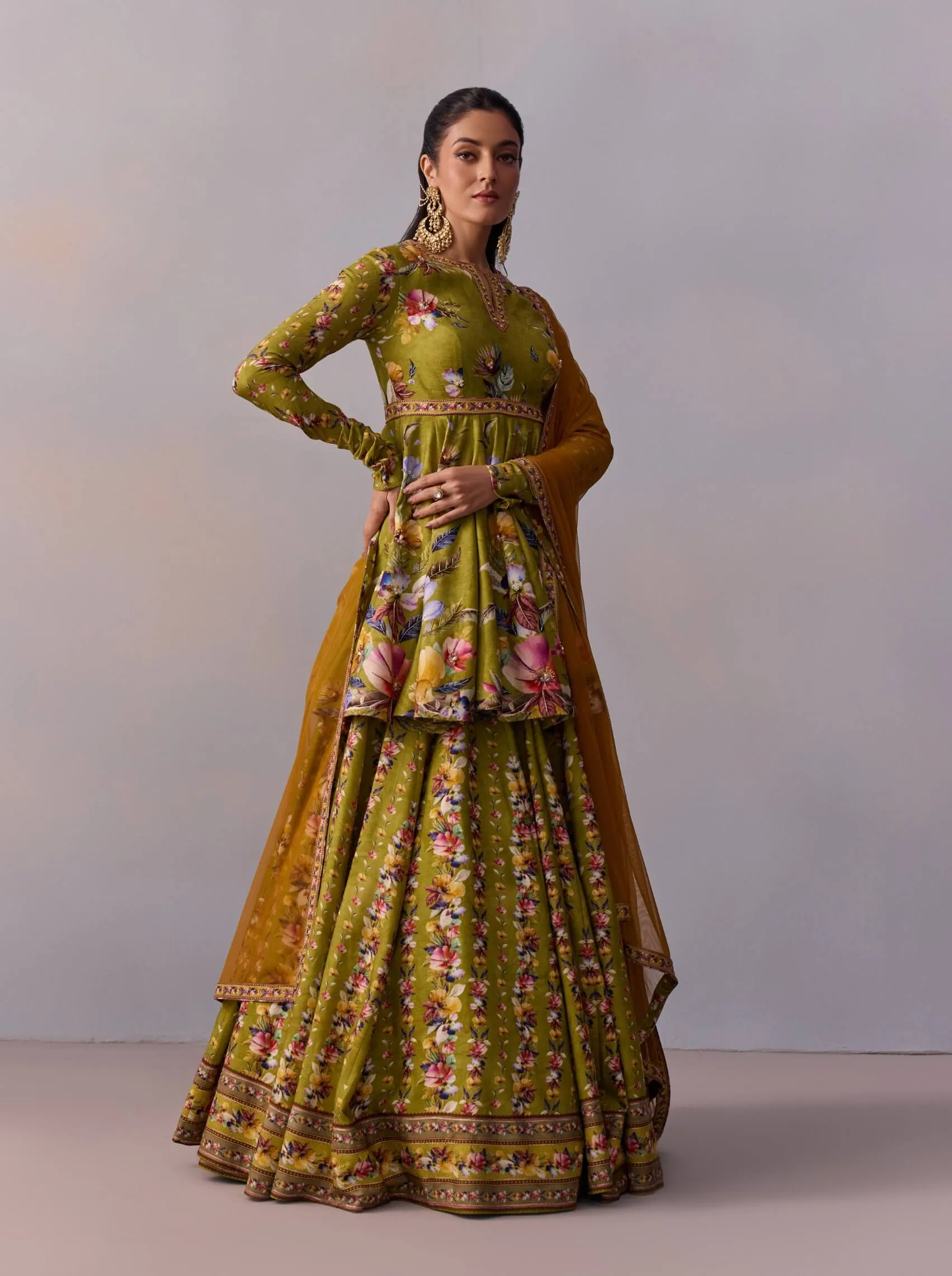Taisha olive green peplum and lehenga set
