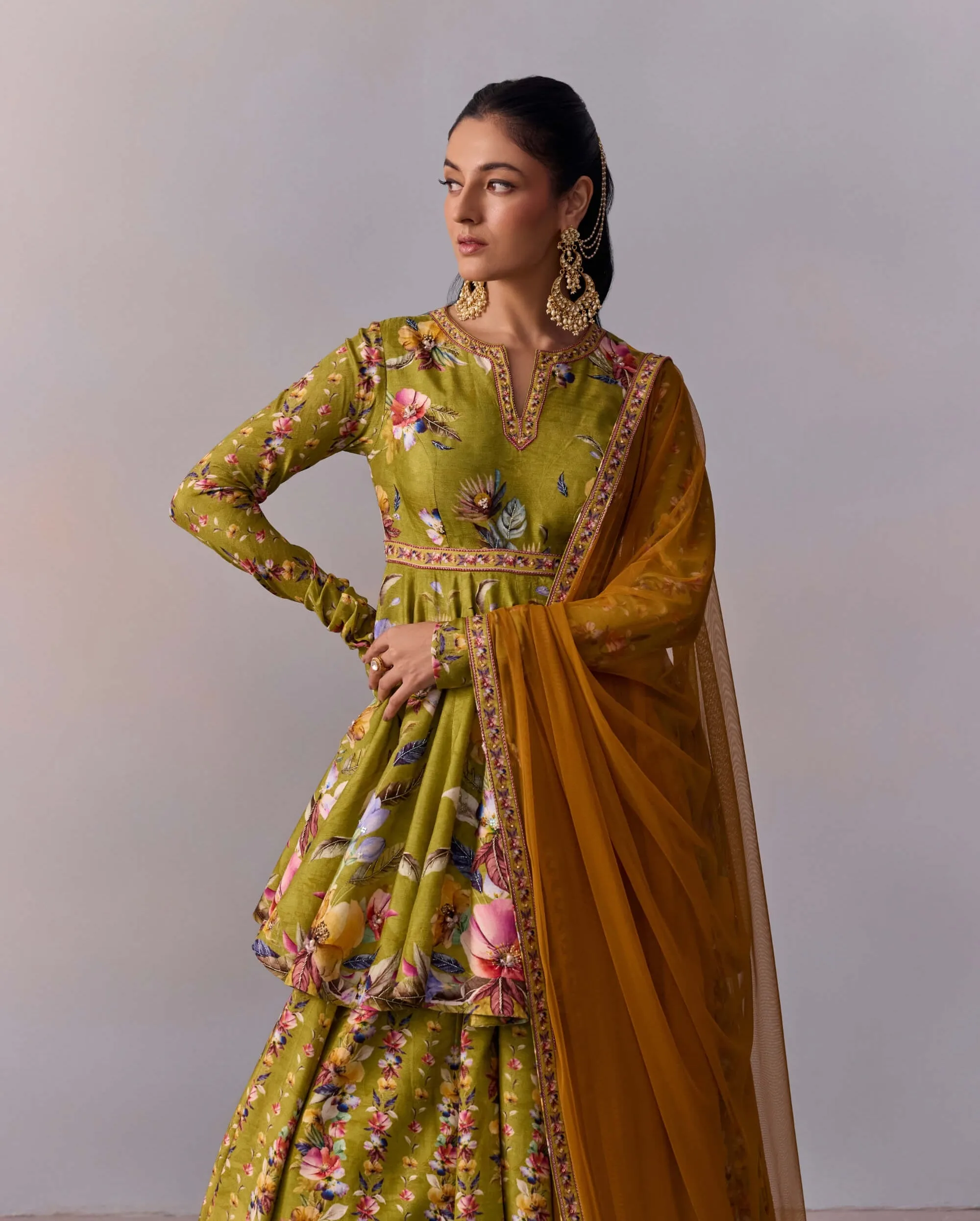 Taisha olive green peplum and lehenga set