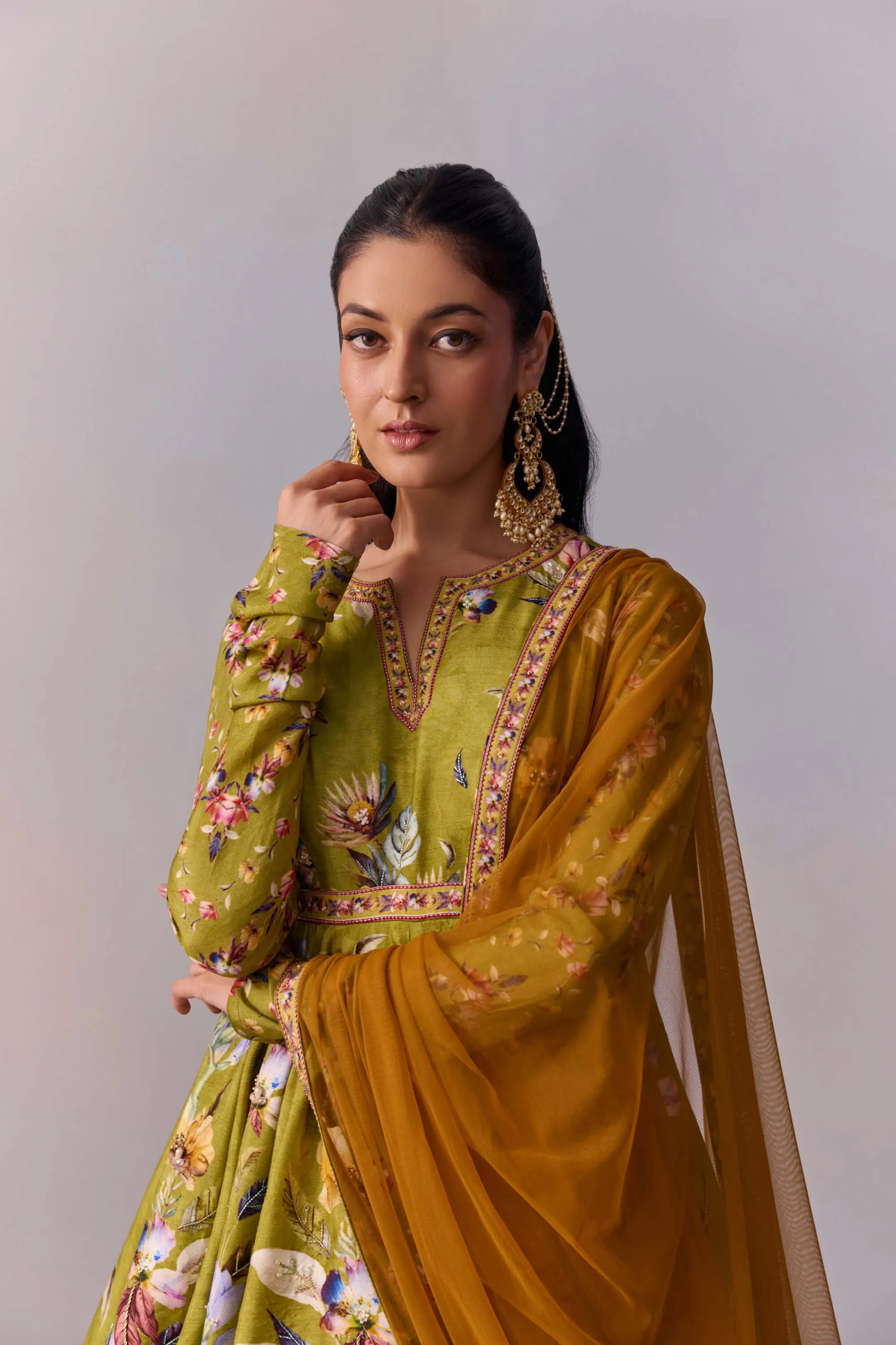 Taisha olive green peplum and lehenga set