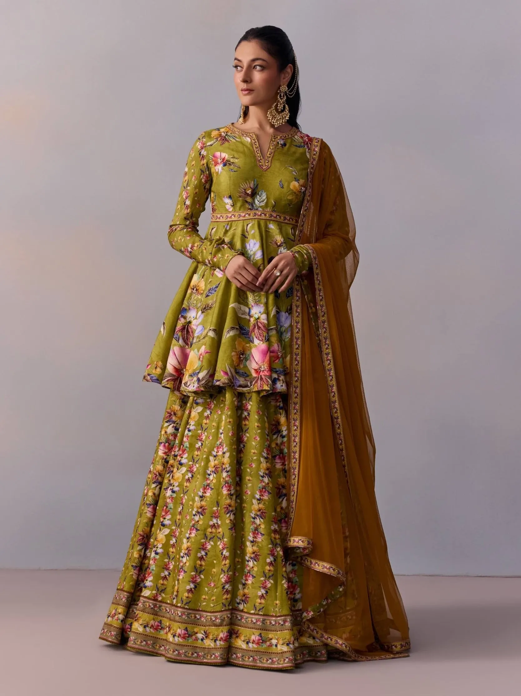Taisha olive green peplum and lehenga set