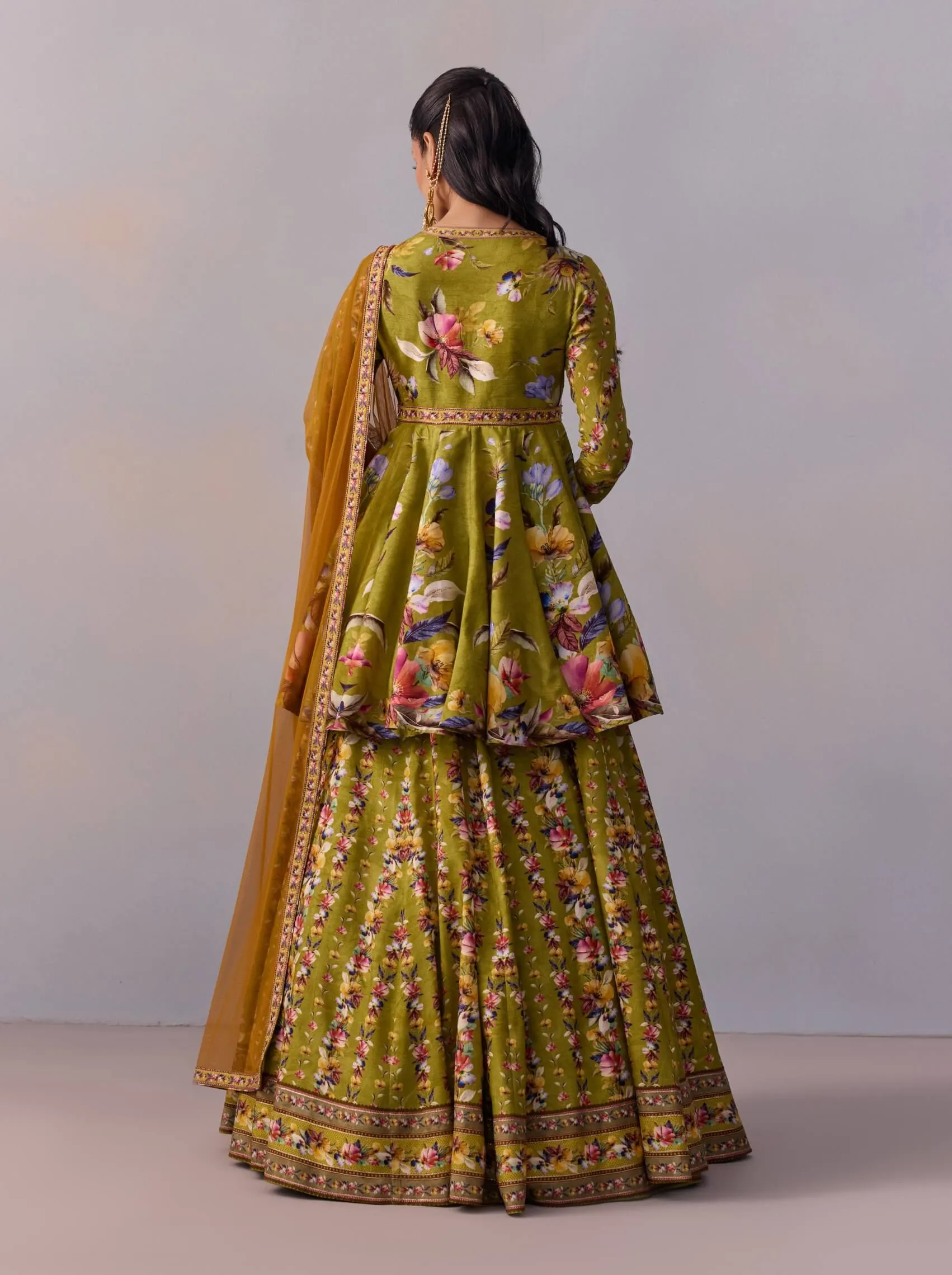 Taisha olive green peplum and lehenga set